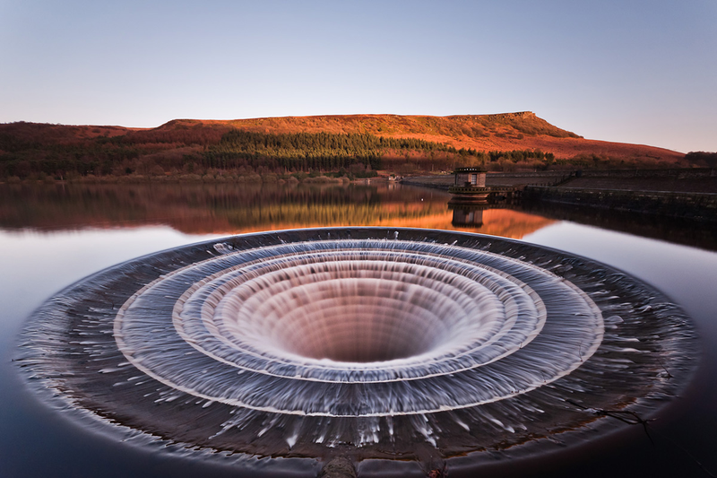 Illustration for article titled These 21 Enormous Man Made Holes Will Give You Vertigo